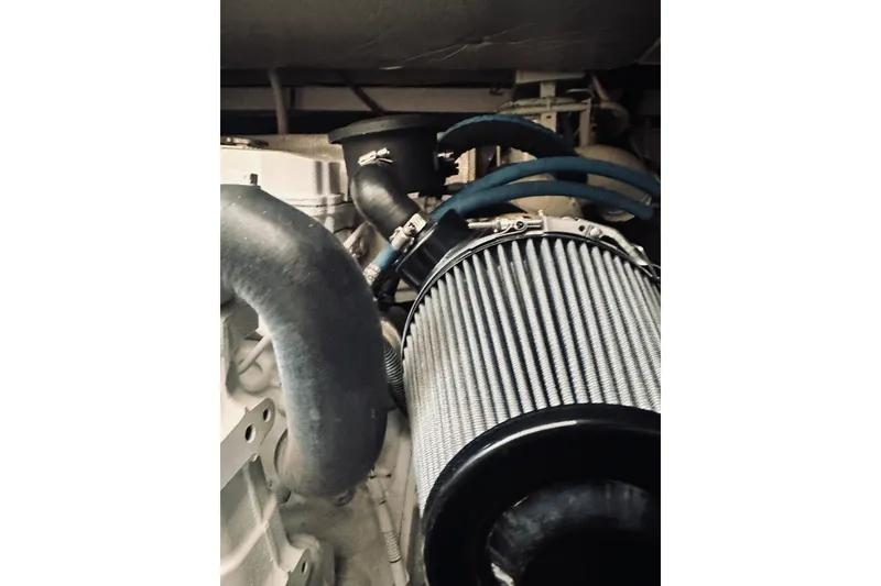 Slide: The Image of Engine room of 2008 Sabre 38 Hard Top Express, showcasing mechanical components. - 54