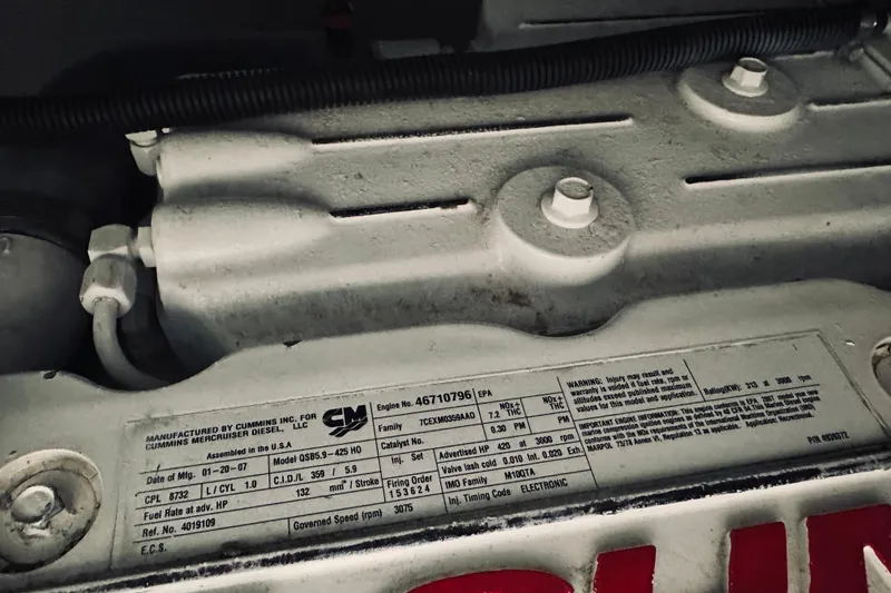 Slide: The Image of Engine component of 2008 Sabre 38 Hard Top Express with hoses and fittings. - 60