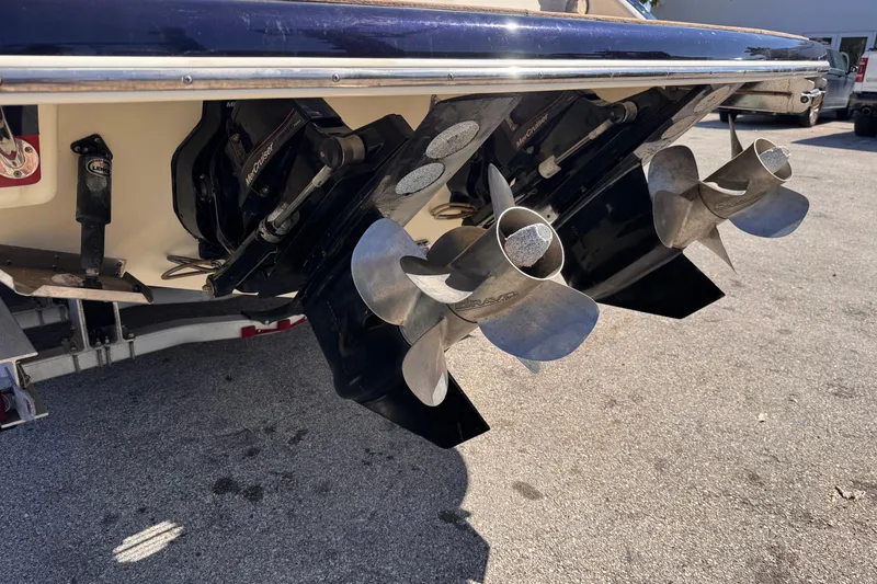 Slide: The Image of 2019 Chris-Craft Corsair 30 boat propellers and stern view. - 18