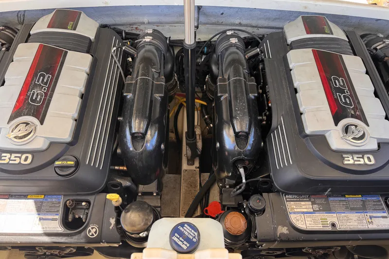 Slide: The Image of Twin Mercury 6.2L engines in a 2019 Chris-Craft Corsair 30 boat. - 21