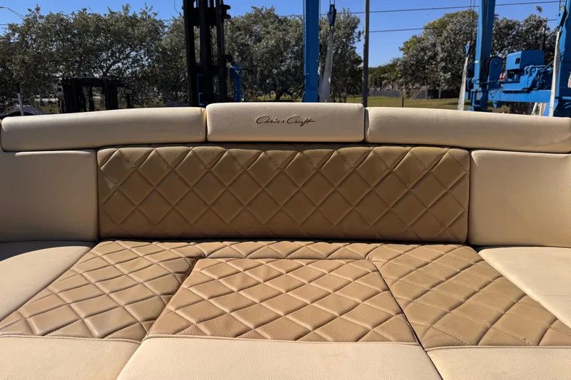 Slide: The Image of Luxurious leather seating on 2019 Chris-Craft Corsair 30 boat, featuring diamond stitching. - 8