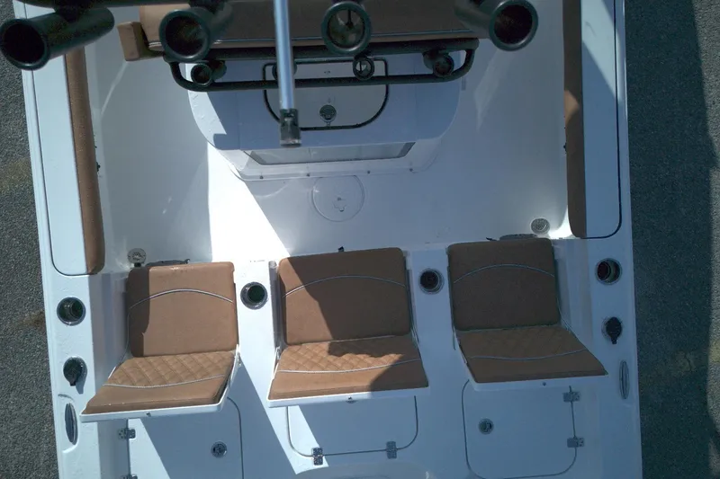 Slide: The Image of Overhead view of 2026 Sea Hunt BX 25 FS boat interior with brown seating. - 10