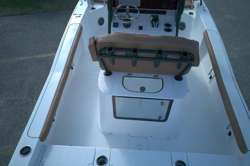 Slide: The Image of 2026 Sea Hunt BX 25 FS boat interior with seating and steering console. - 4