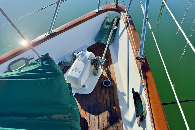 Slide: The Image of Deck of 1988 Hans Christian Christina sailboat with anchor and green cover. - 32