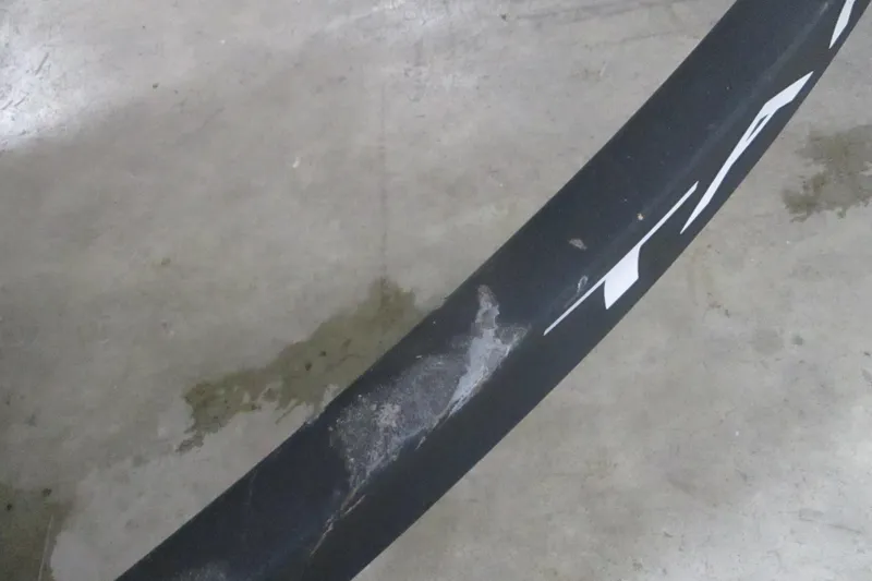 Slide: The Image of Close-up of a 2025 Tahoe T18 tire with visible wear on concrete floor. - 6