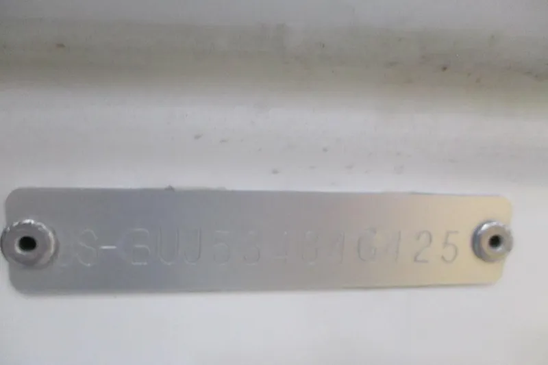 Slide: The Image of Metal identification plate on 2025 Tahoe T18 boat. - 7