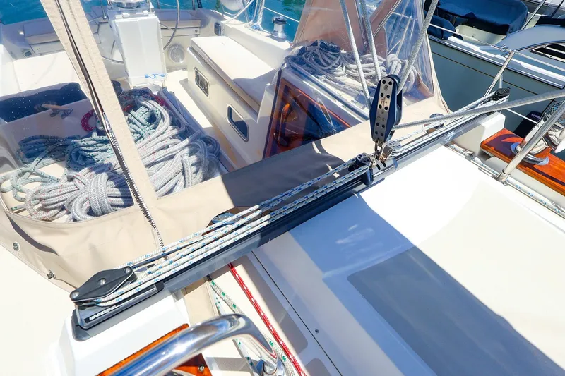 Slide: The Image of Cockpit of a 1999 Tartan 3500 sailboat with ropes and rigging. - 10