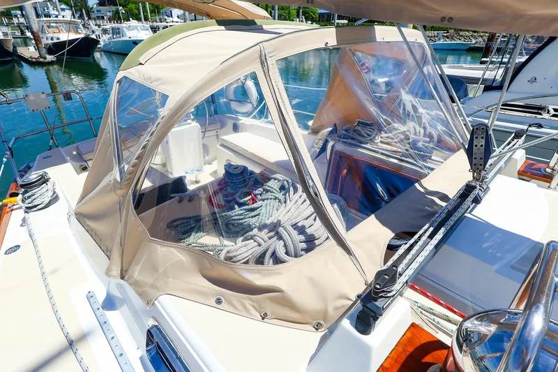 Slide: The Image of Tartan 3500 sailboat cockpit with ropes, docked in marina, sunny day, 1999 model. - 11