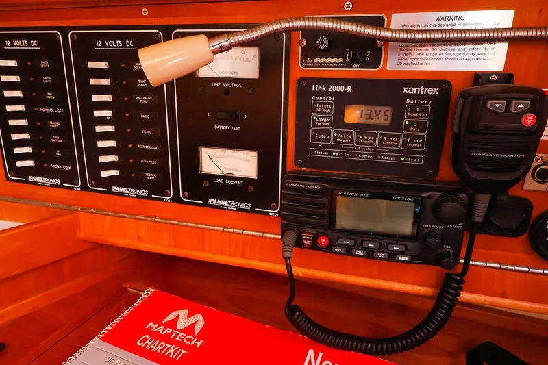 Slide: The Image of Electrical control panel on a 1999 Tartan 3500 sailboat with navigation equipment. - 25