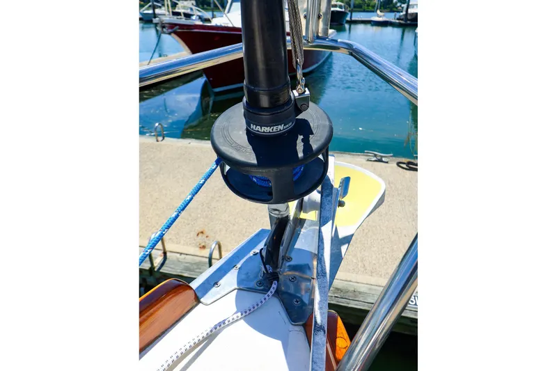 Slide: The Image of Close-up of a 1999 Tartan 3500 sailboat's deck hardware at a marina. - 5