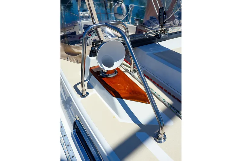 Slide: The Image of Deck of 1999 Tartan 3500 sailboat with stainless steel fittings and wooden accents. - 8