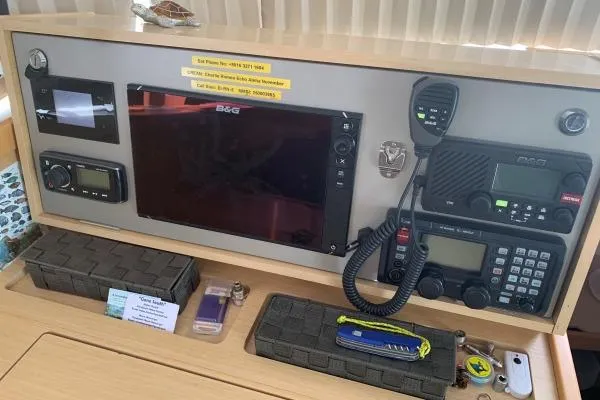 Slide: The Image of Control panel of a 2017 Lagoon 42 catamaran with navigation and communication equipment. - 31