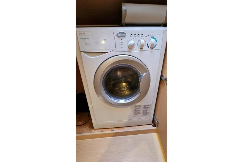 Slide: The Image of Front-loading washing machine inside a Lagoon 42, 2017 model. - 33