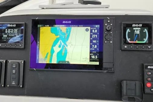 Slide: The Image of Navigation system on a 2017 Lagoon 42 catamaran, displaying nautical charts and data. - 36