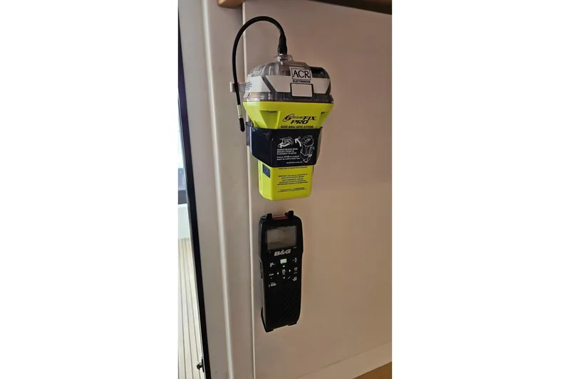 Slide: The Image of Emergency beacon and device on 2017 Lagoon 42 yacht interior wall. - 39