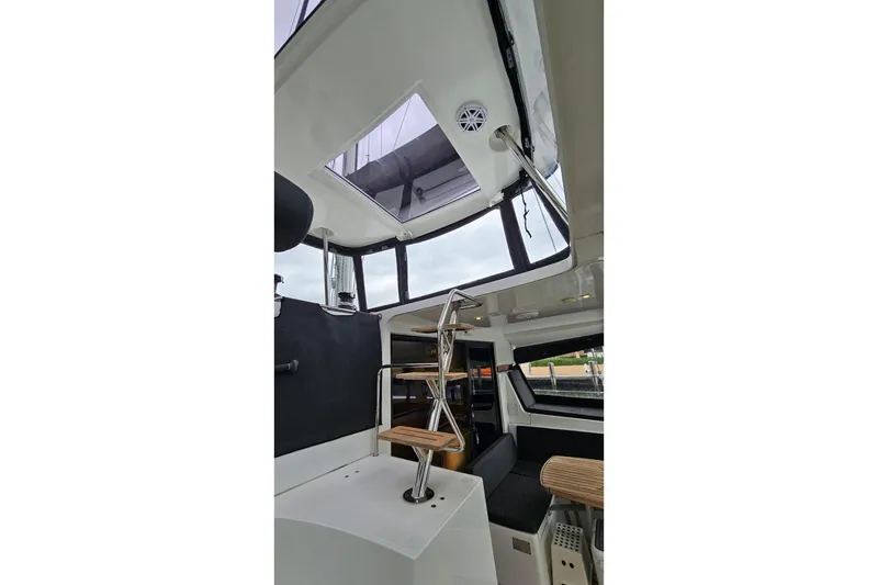 Slide: The Image of Interior view of 2017 Lagoon 42 catamaran with modern design and skylight. - 45