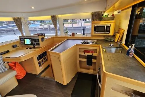 Slide: The Image of Modern kitchen interior of 2017 Lagoon 42 catamaran with appliances and navigation equipment. - 6