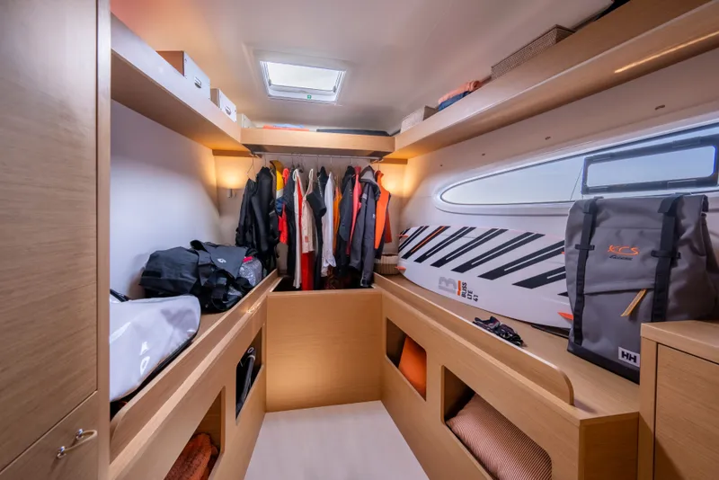 Slide: The Image of Interior of Excess EXCESS 14 yacht, 2026 model, featuring storage and clothing. - 5