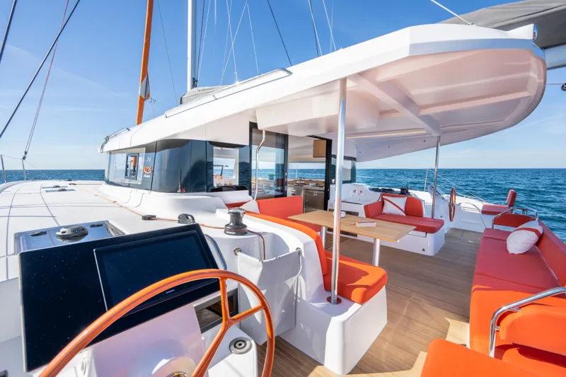 Slide: The Image of Excess EXCESS 14 catamaran 2026 with modern deck design. - 4