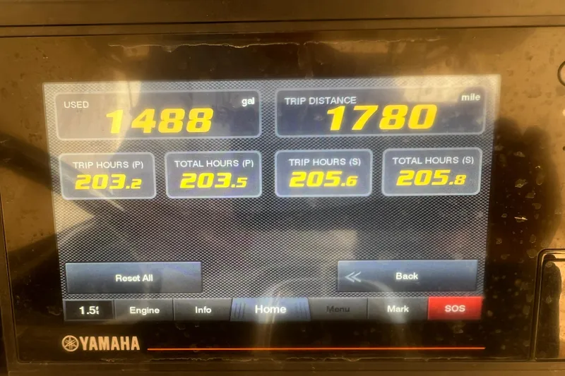 Slide: The Image of Yamaha display showing fuel usage and trip data for 2005 Boston Whaler 320 Outrage. - 14