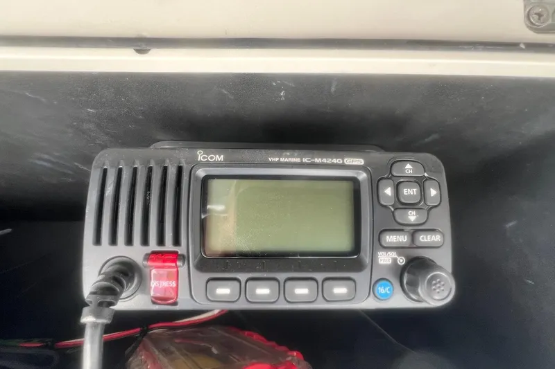 Slide: The Image of Icom VHF marine radio IC-M424G GPS on 2005 Boston Whaler 320 Outrage. - 20