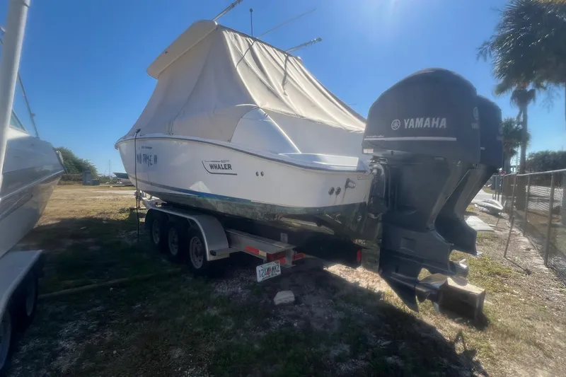 Slide: The Image of 2005 Boston Whaler 320 Outrage boat with Yamaha engine on trailer, sunny day. - 3