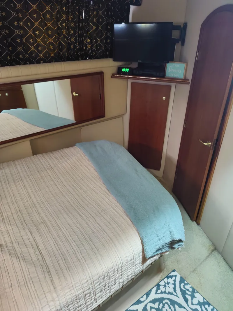 Slide: The Image of Interior of 2001 Cruisers Yachts 3750 Motoryacht with bedroom and bathroom. - 10
