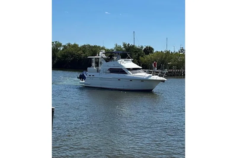 Slide: The Image of 2001 Cruisers Yachts 3750 Motoryacht cruising on a sunny day. - 38