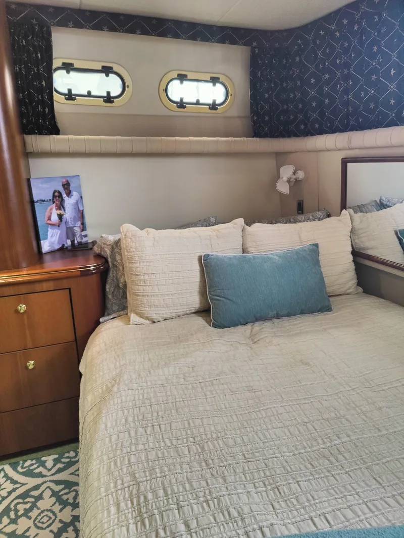 Slide: The Image of Interior of 2001 Cruisers Yachts 3750 Motoryacht with bed and TV. - 12
