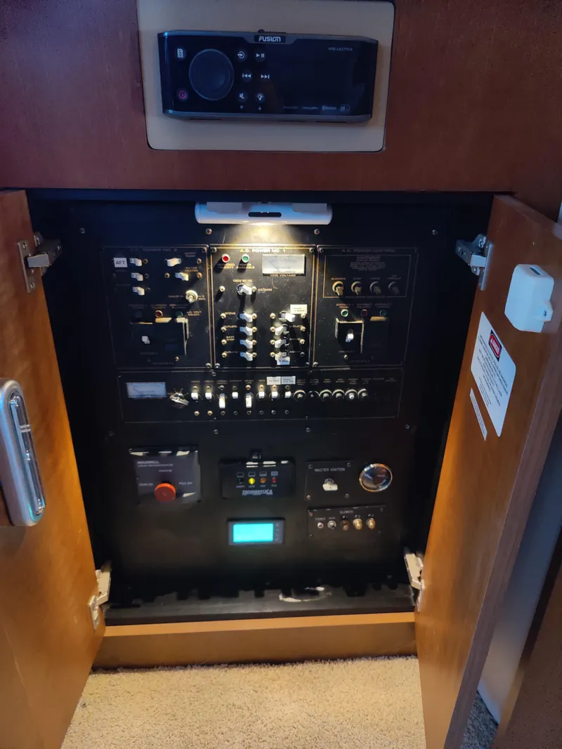 Slide: The Image of 2001 Cruisers Yachts 3750 Motoryacht bathroom with toilet and mirror. - 16