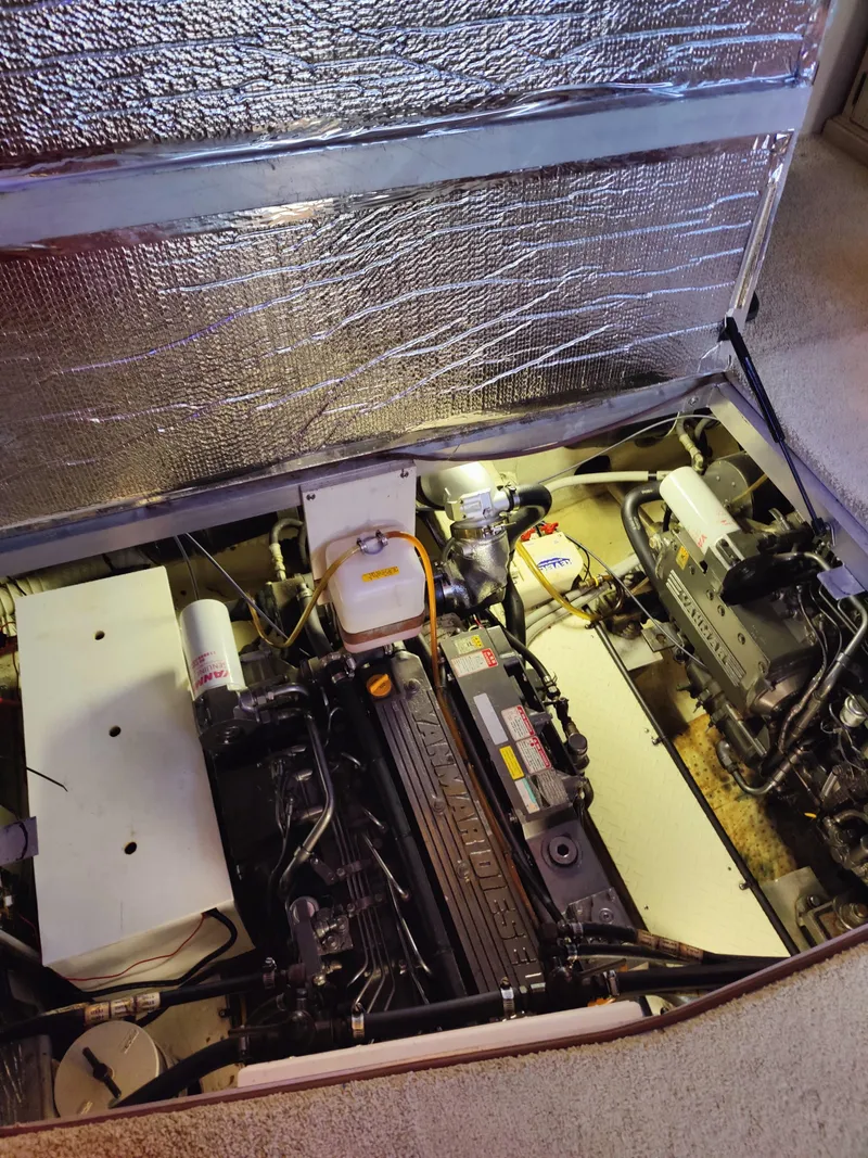 Slide: The Image of Luxurious interior of 2001 Cruisers Yachts 3750 Motoryacht with plush seating and elegant wood finishes. - 19