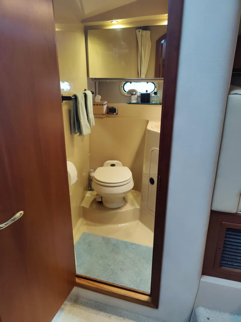 Slide: The Image of 2001 Cruisers Yachts 3750 Motoryacht bathroom, compact and functional. - 7