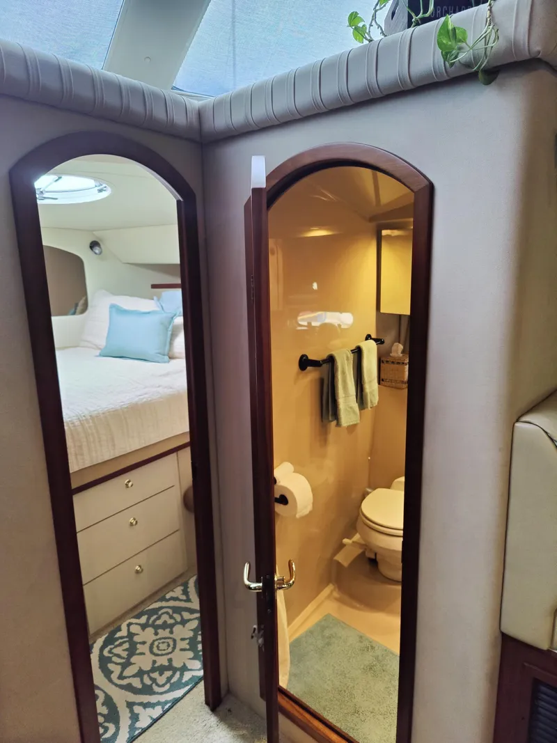 Slide: The Image of Interior of 2001 Cruisers Yachts 3750 Motoryacht with bathroom and bedroom. - 9
