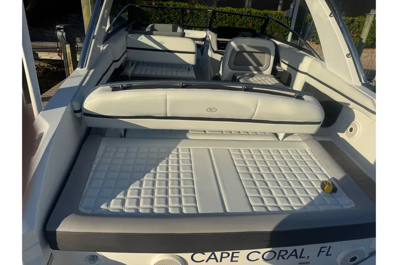 Slide: The Image of 2023 Cobalt 30SC Outboard boat interior with white seating, Cape Coral, FL. - 6
