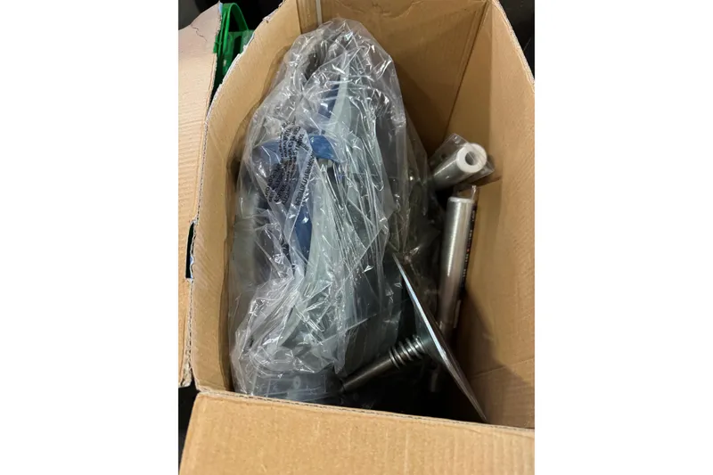 Slide: The Image of Cardboard box with War Eagle 648LDV 2019 parts, wrapped in plastic. - 13