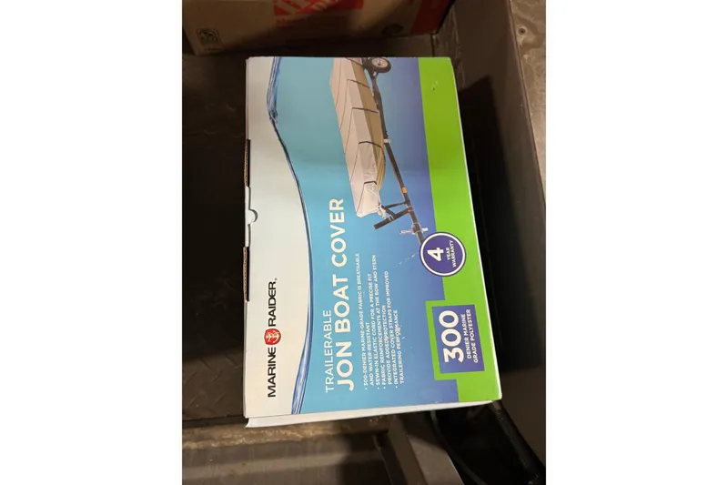 Slide: The Image of Box of Marine Raider trailerable jon boat cover, 300 denier polyester, 4-year warranty. - 14