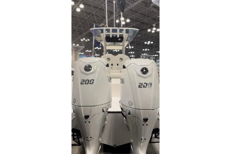 Slide: The Image of Two Yamaha 200 outboard motors on an Edgewater 250CC boat, year 2026. - 5