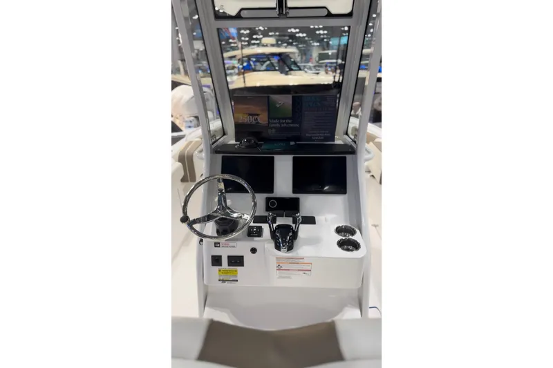 Slide: The Image of Interior view of Edgewater 250CC 2026 helm station. - 7