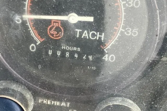 Slide: The Image of Tachometer of 1989 Sabre 30 showing 842 hours, dusty gauge display. - 13