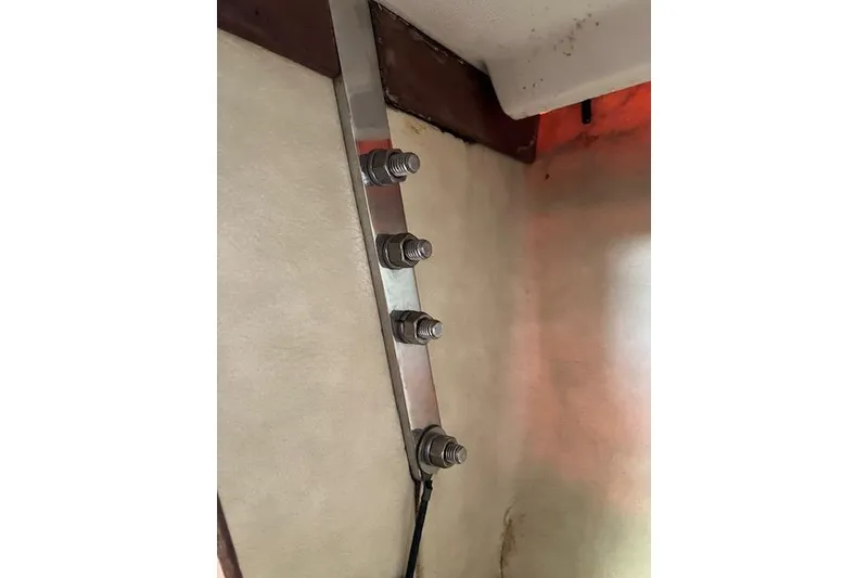 Slide: The Image of Interior view of 1989 Sabre 30 sailboat showing metal bolts and fittings. - 31