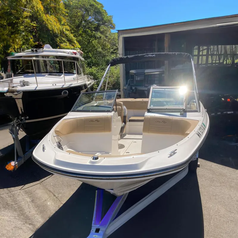 The Image of 2021 Sea Ray SPX 210 Outboard boat outdoors in sunlight. - 5