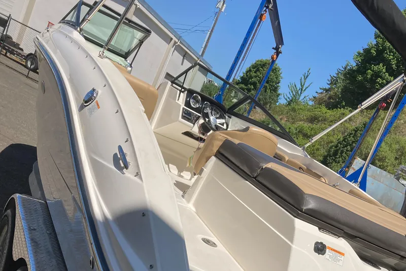 Slide: The Image of 2021 Sea Ray SPX 210 Outboard boat, interior view, sunny day. - 9