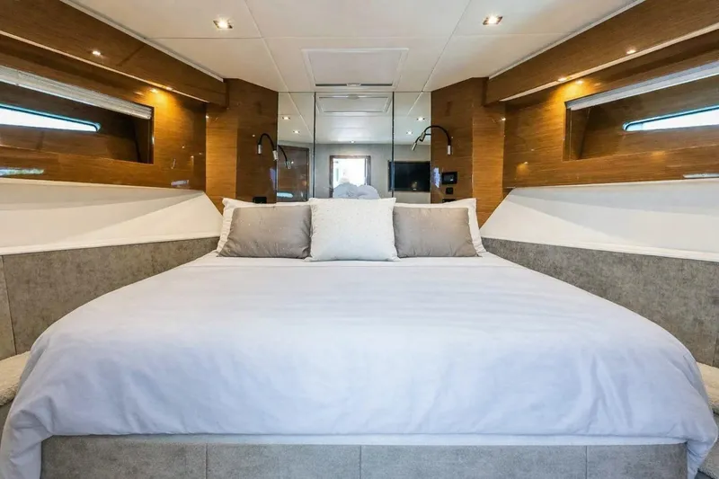 Slide: The Image of Luxurious bedroom interior of 2018 Cruisers Yachts 50 Cantius with modern design and cozy bedding. - 16