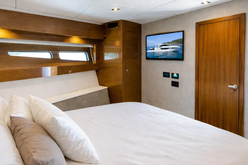 Slide: The Image of Luxurious bedroom interior of 2018 Cruisers Yachts 50 Cantius with modern decor and TV. - 17