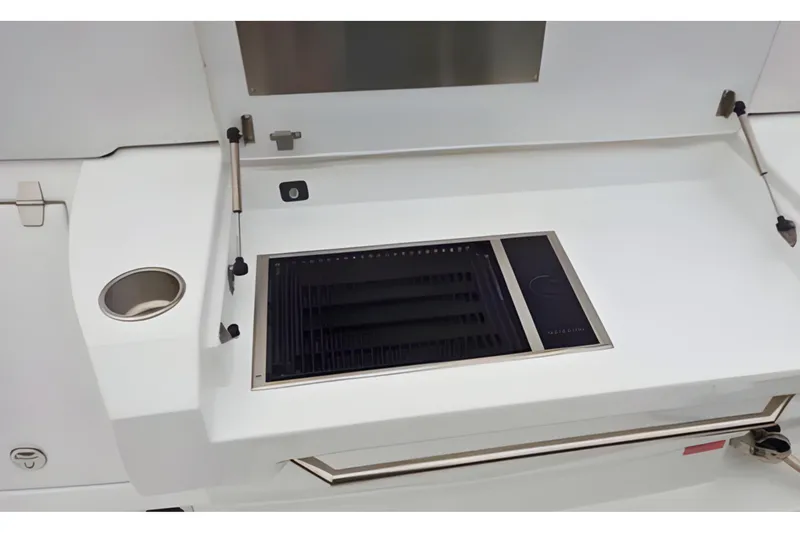 Slide: The Image of 2018 Cruisers Yachts 50 Cantius outdoor grill and countertop detail. - 6