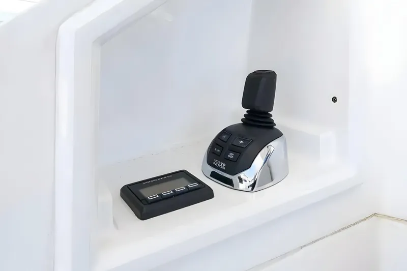 Slide: The Image of Control panel of 2018 Cruisers Yachts 50 Cantius with joystick and display. - 9