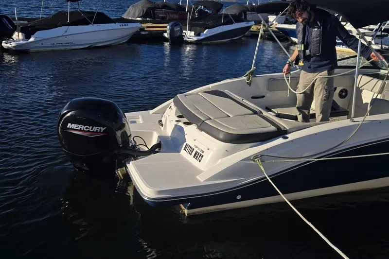 Slide: The Image of 2023 Sea Ray SPX 210 Outboard boat with Mercury engine docked at marina. - 20