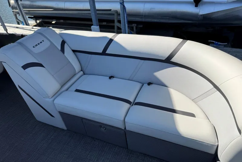 Slide: The Image of 2024 Crest Classic LX 220 SLRC boat seating with sleek, modern design and comfortable upholstery. - 19