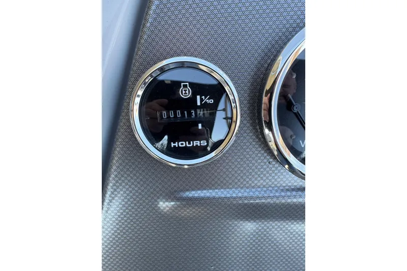 Slide: The Image of Dashboard of 2024 Crest Classic LX 220 SLRC showing hour meter reading. - 23