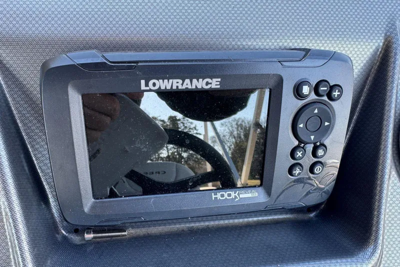 Slide: The Image of Lowrance Hook Reveal fish finder on 2024 Crest Classic LX 220 SLRC boat dashboard. - 24